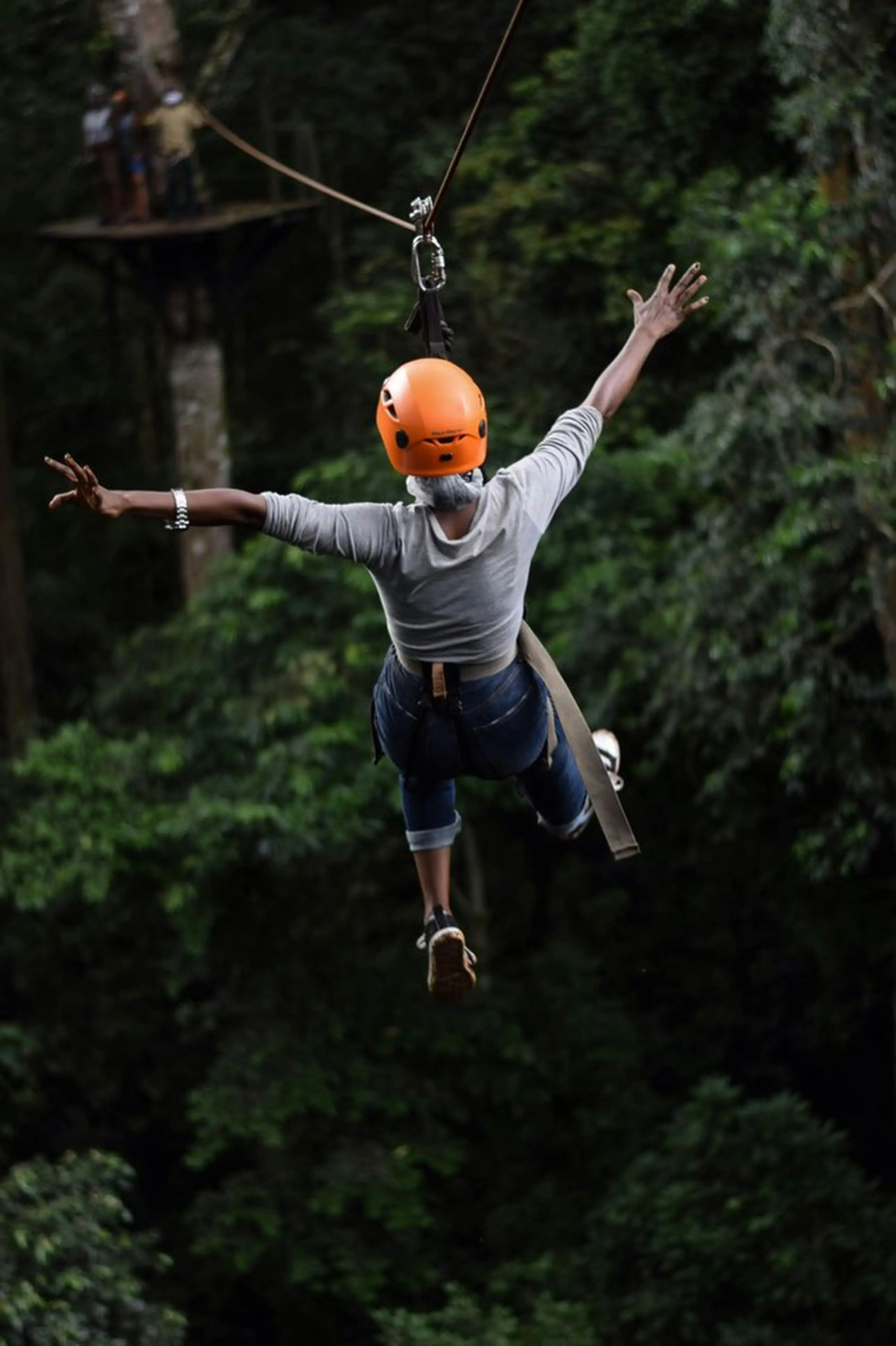 Image of man ziplining